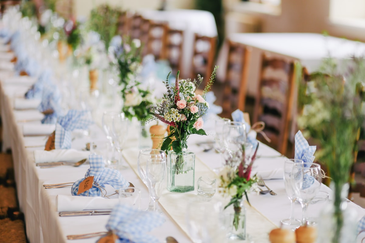 A celebratory toast at a long evening table
